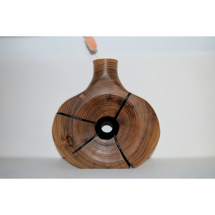 Soliflore taillé et sculptée dans une rondelle de bois de robinier