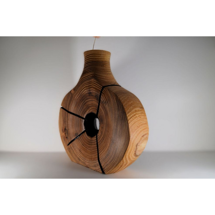 Soliflore taillé et sculptée dans une rondelle de bois de robinier