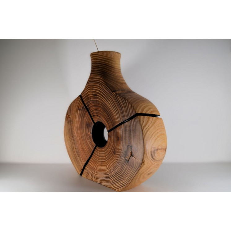 Soliflore taillé et sculptée dans une rondelle de bois de robinier